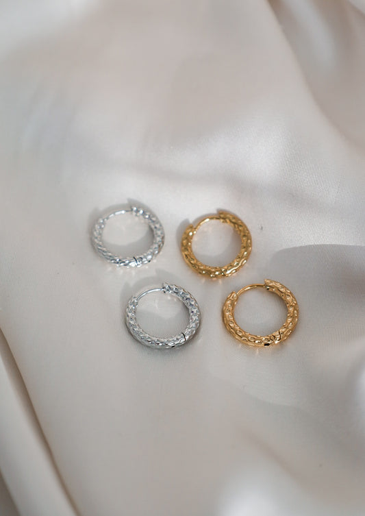 Korvakorurengas, vedenkestävä